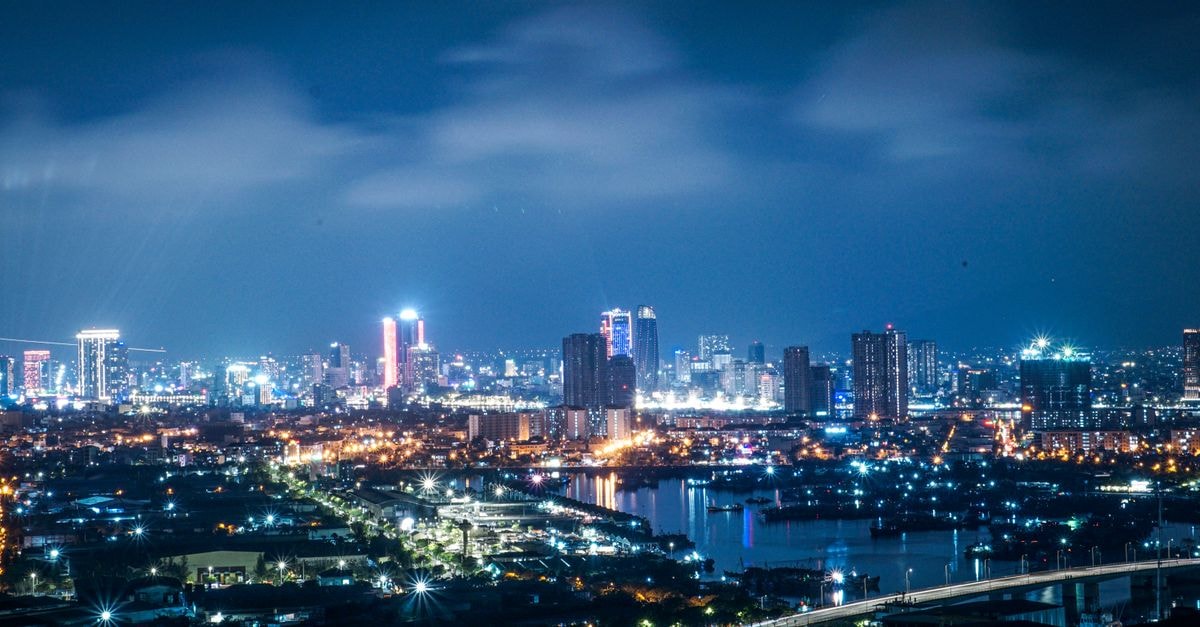 A dazzling night view of Ho Chi Minh City's skyline showcasing the illuminated skyscrapers and vibrant city lights.