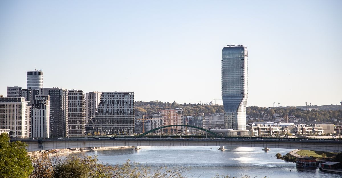Mercure Belgrade Excelsior in Belgrade: 100 Years Near Republic Square A stunning view of Belgrade's skyline with the Belgrade Tower by the river under a clear sky.
