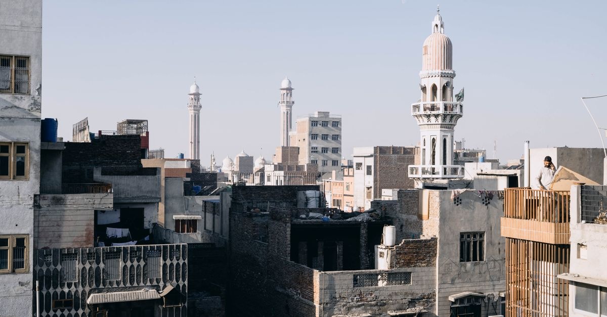Aerial view of Faisalabad, Punjab featuring traditional cityscape and iconic architecture.