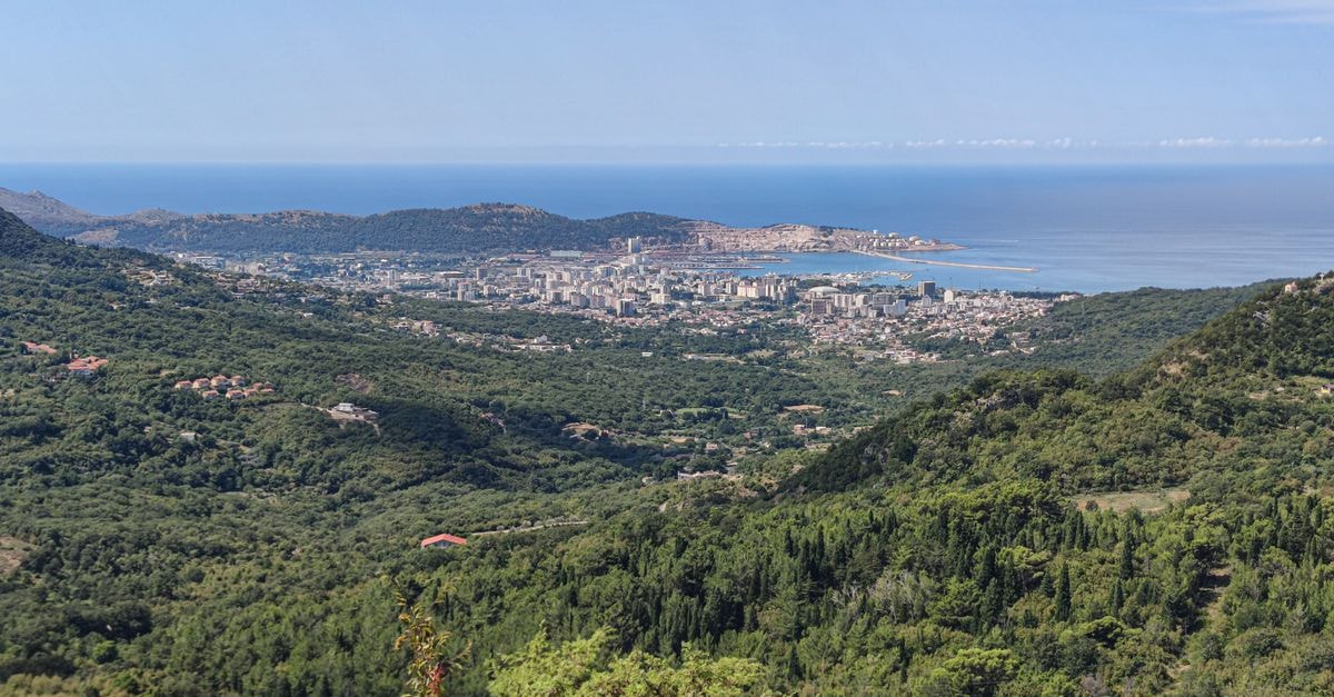 Franca Hotels in Bar, Montenegro: A Four-Star Stay on Bulevar dinastije Petrović Breathtaking view of Bar, Montenegro with lush hills and blue sea.
