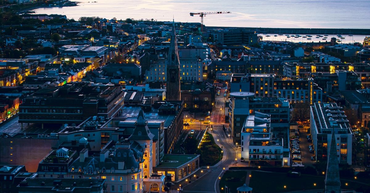 Delta Beausejour, Moncton — Where Maritime History Meets Downtown Stays A stunning aerial view of Dublin, Ireland at dusk, showcasing illuminated streets and cityscape by the water.