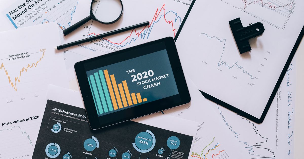 Oracle wins 10-year, $6.99B Pentagon software deal as S&P downgrade flags OpenAI credit risk Tablet displaying 2020 stock market crash amidst graphs and charts. Perfect for financial analysis themes.