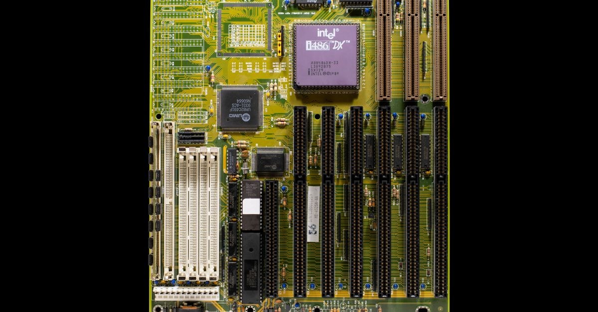 SK hynix eyes Intel's Ohio fabs for first U.S. memory chip production Old motherboard featuring an Intel i486 processor, showcasing retro computer technology.