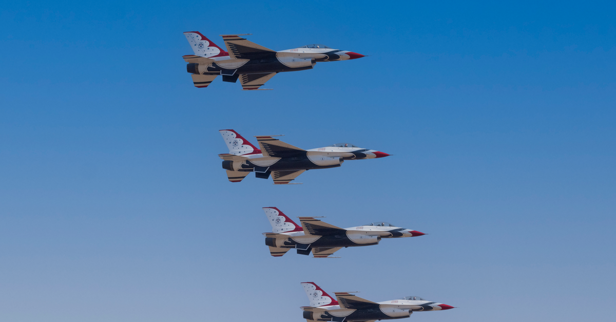 Oil futures surge after Iran's missile strike on US forces shatters fragile ceasefire US Air Force Thunderbirds perform an aerial maneuver in a clear blue sky, showcasing precision flying.