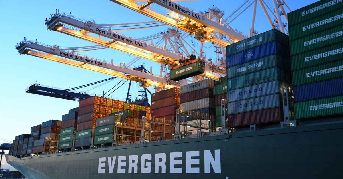 Moonshot's Kimi K3 open-weight release draws US distillation and chip-export scrutiny An Evergreen container ship loading at the Port of Baltimore during daytime.