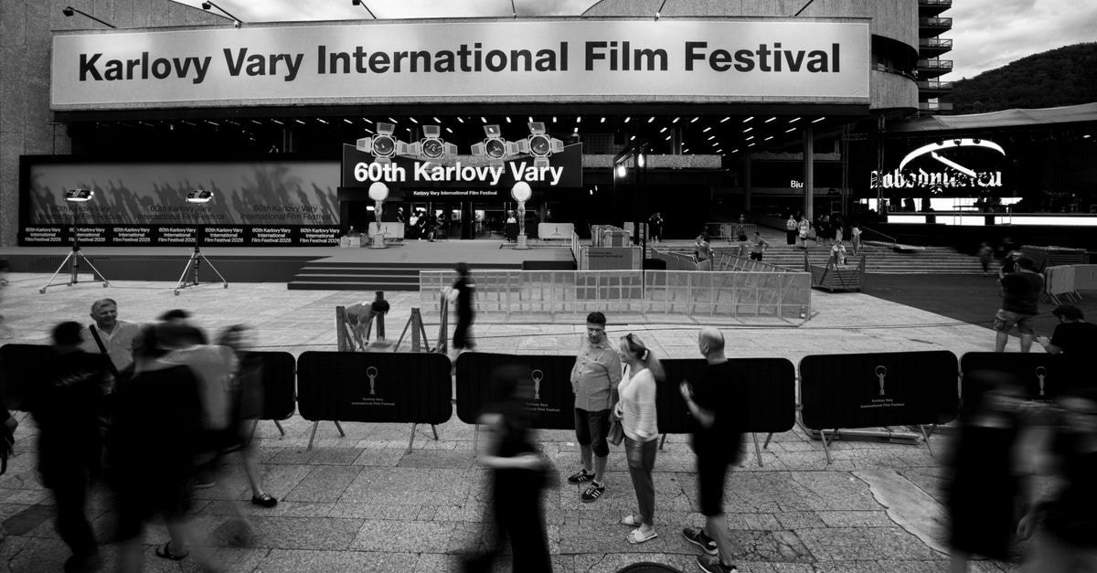 Global film festivals expand reach from Bournemouth to Kashmir People at the 60th Karlovy Vary International Film Festival in black and white.