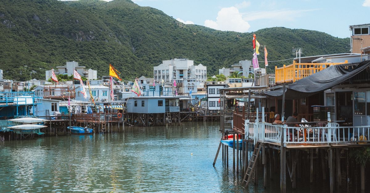 Shatin Travel Guide: Planning Tips, Costs and Things to Do Picturesque stilt houses in Tai O, Hong Kong, showcasing traditional fishing village life by the water.