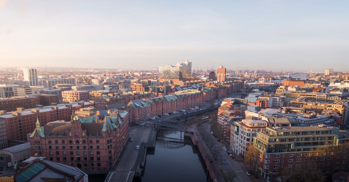 Captivating aerial view of Hamburg's historic Speicherstadt district showcasing iconic architecture under clear skies.