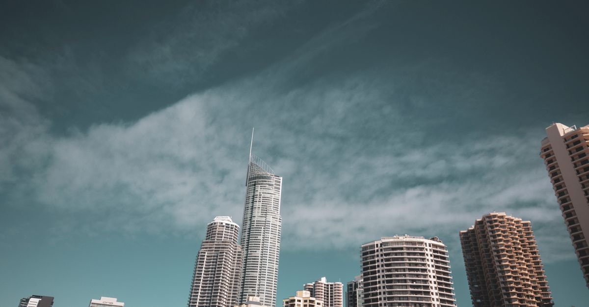 Hilton Surfers Paradise Hotel & Residences, Gold Coast — A Striking Dual-Tower Stay A stunning view of Surfers Paradise skyline with modern skyscrapers under a clear blue sky.