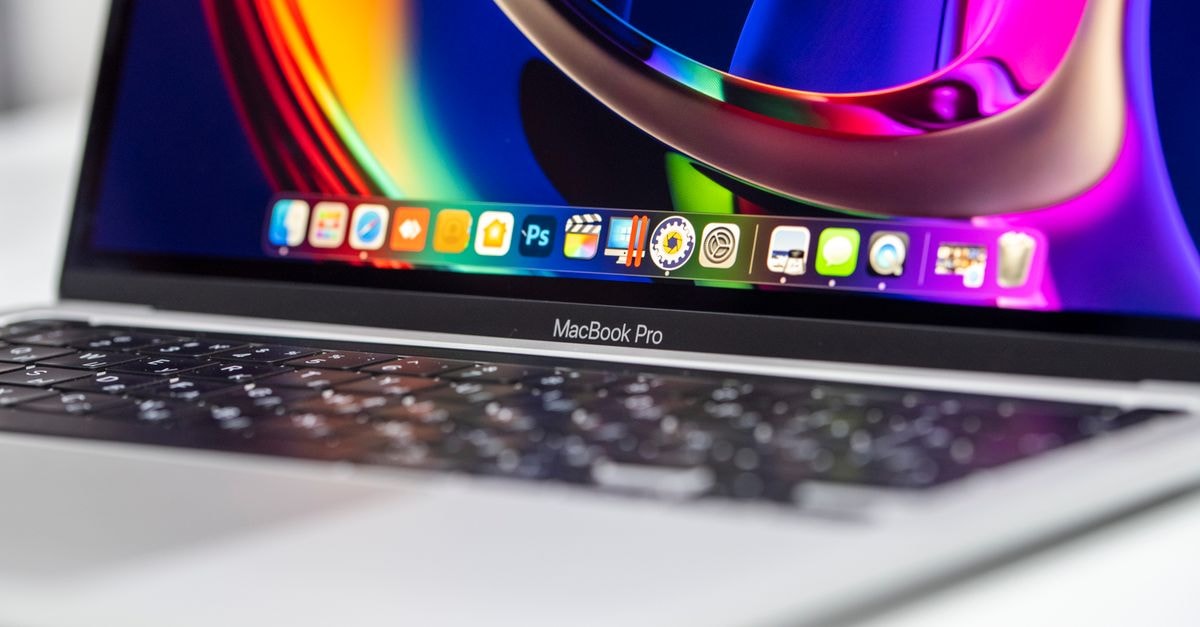 Apple hits $5 trillion valuation, debuts US device leasing program with Klarna A vibrant close-up of a MacBook Pro showcasing its colorful screen and keyboard.