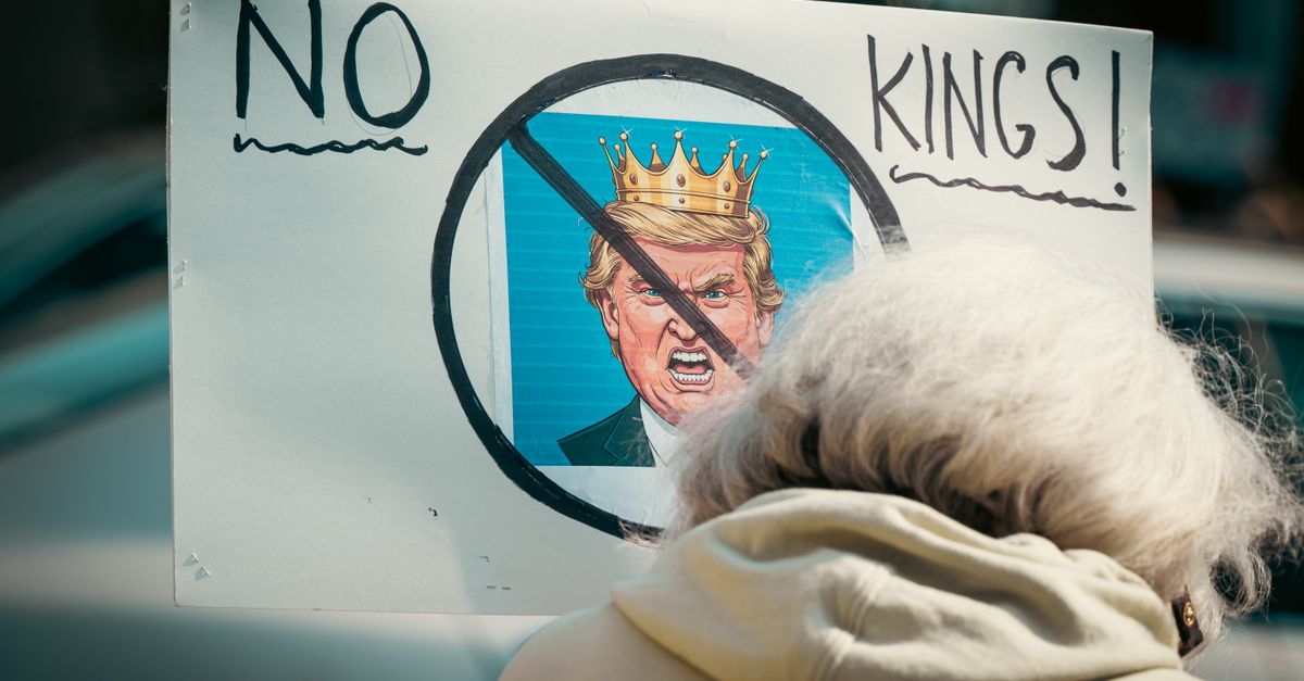 Jon Stewart Criticizes Trump's WHCD Speech and Calls for the Dinner's End on The Daily Show A protest sign reading 'No Kings' depicts resistance against monarchy with a satirical image.