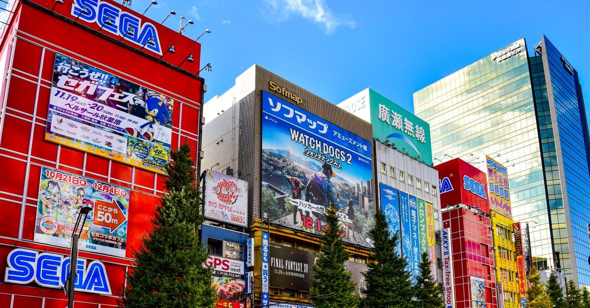 Colorful display of buildings and signs in Akihabara, Tokyo, showcasing city life and vibrant urban culture.