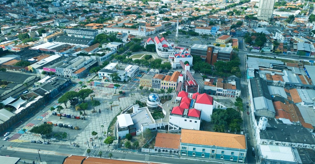 Hotel Tocantins in Imperatriz: A Budget Stop on the BR-010 High-angle view of Fortaleza's urban landscape with architectural landmarks and red rooftops.