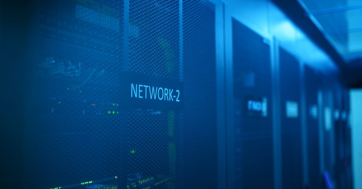 Palo Alto Networks launches AI-driven Unit 42 service using Claude and GPT models A modern server room featuring network equipment with blue illumination. Ideal for technology themes.