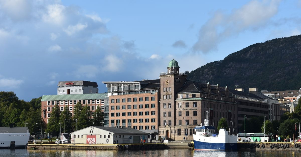 Bergen Børs Hotel in Bergen: A Designer Stay Inside a Historic Stock Exchange Discover the beautiful waterfront architecture and vibrant harbor in Bergen, Norway.