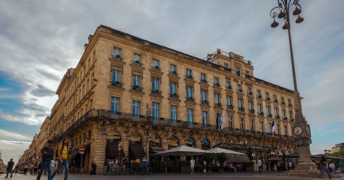 Daytime view of a historic building in Bordeaux, France, showcasing its classic architecture.