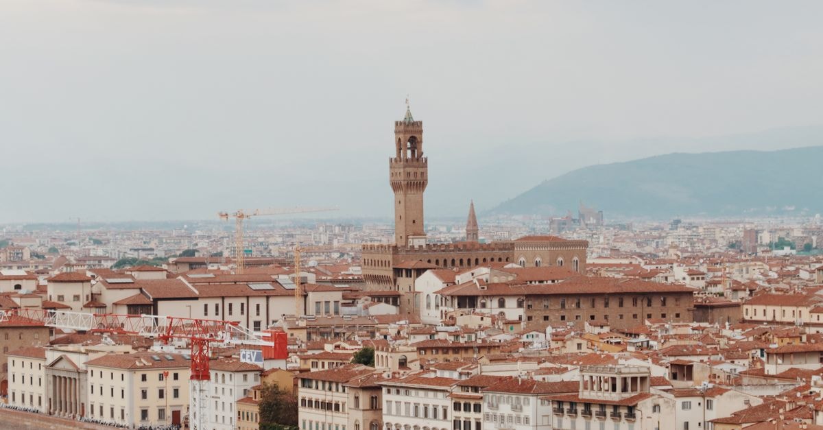 A beautiful aerial view of the Palazzo Vecchio and the cityscape of Florence, Italy.