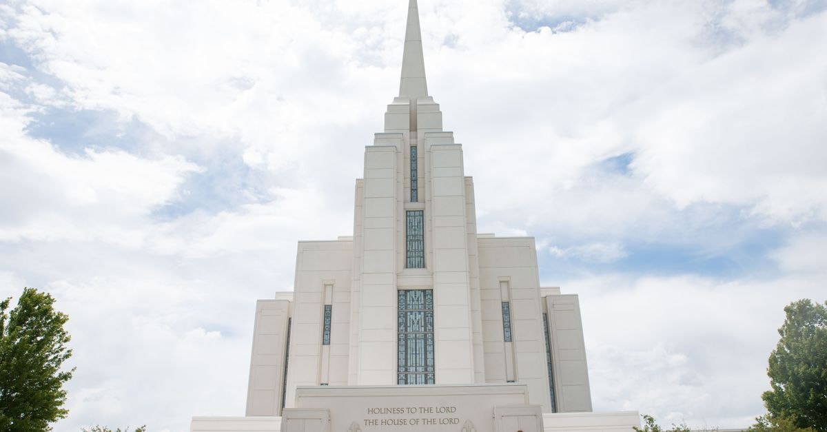 A Slow Travel Guide to Moroni, Grande Comore A striking view of the Rexburg Idaho LDS Temple with a dramatic cloudy sky backdrop. Ideal for architecture and travel themes.
