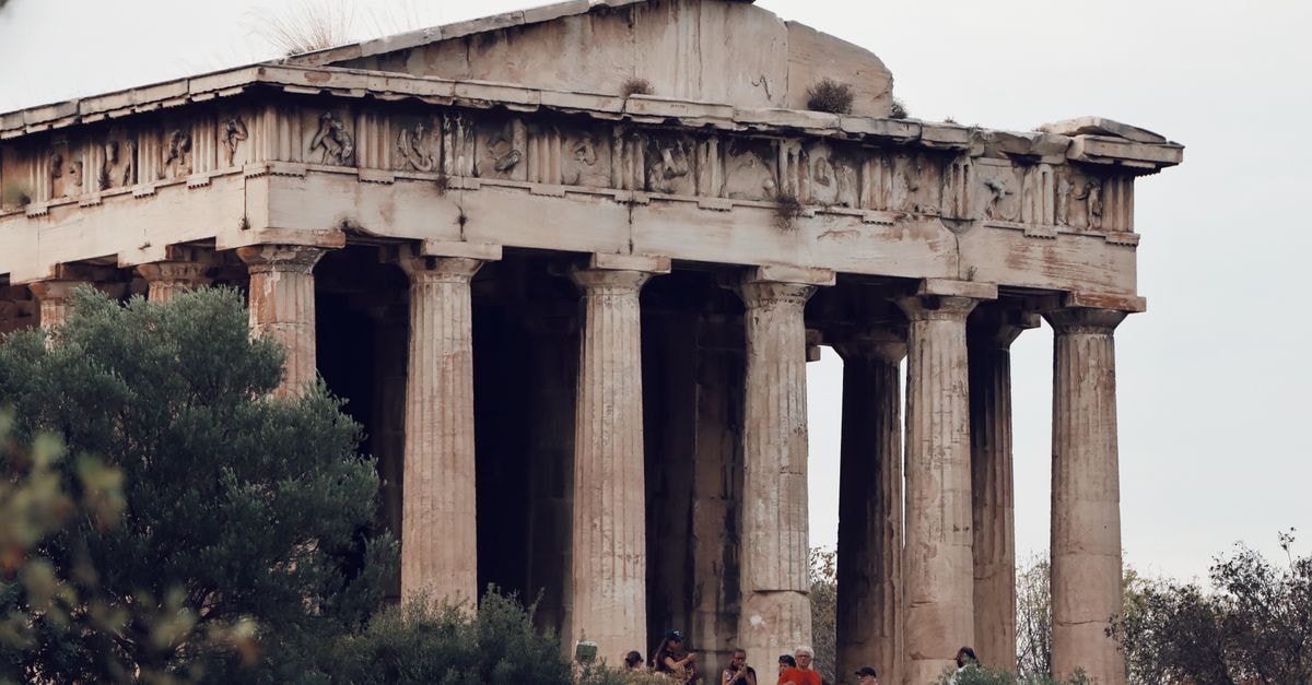Athens Travel Guide for September 2026: Planning Tips and Costs View of the ancient Temple of Hephaestus in Athens, Greece surrounded by greenery.