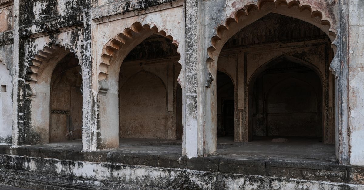 Amarpreet Hotel in Aurangabad: A Central Stay Near Heritage Icons Ancient arched structure showcasing intricate design in Aurangabad, Maharashtra, India.