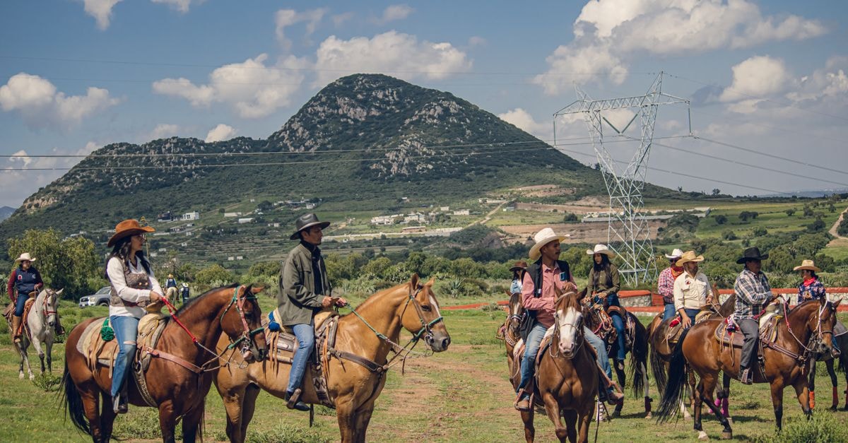 Pachuca travel guide: tips for an easy mountain-city stay A group of Mexican cowboys riding horses in scenic Pachuca de Soto, Hidalgo, México.