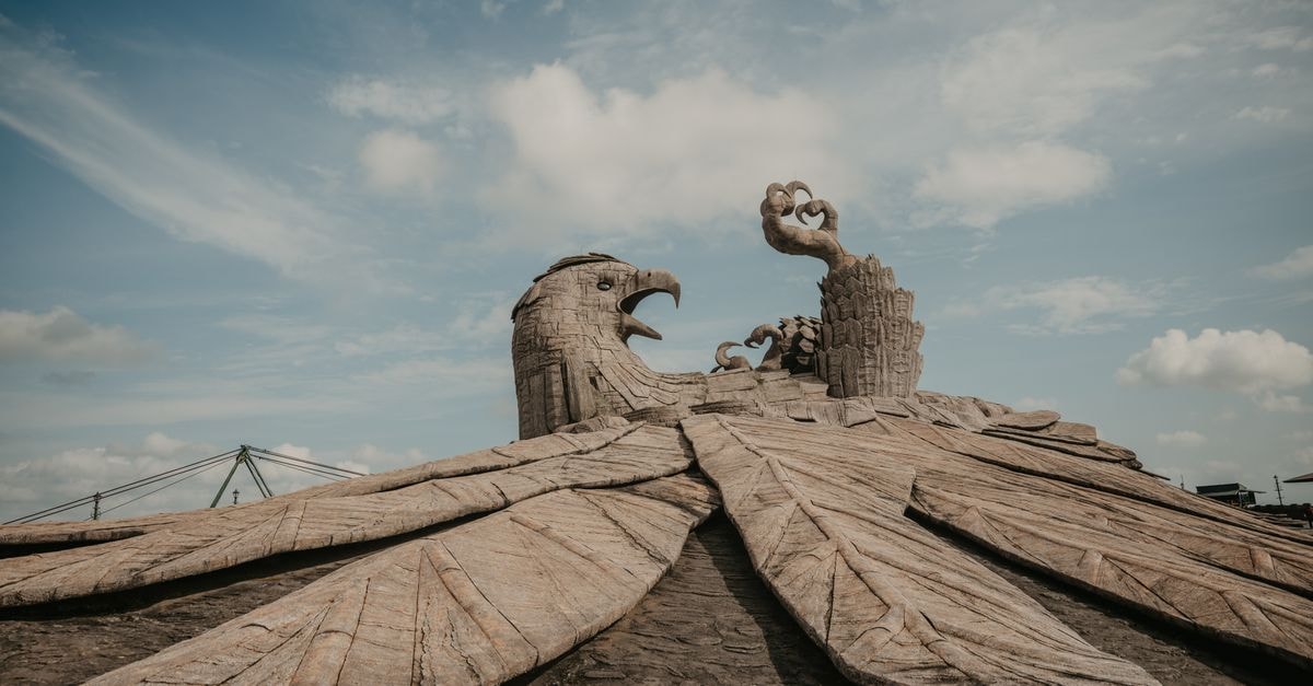 Hotel Sea Palace in Kollam: Rooftop Views of the Laccadive Coast Explore the stunning Jatayu sculpture at Earth Center, capturing Kerala's rich mythology beneath a vibrant sky.