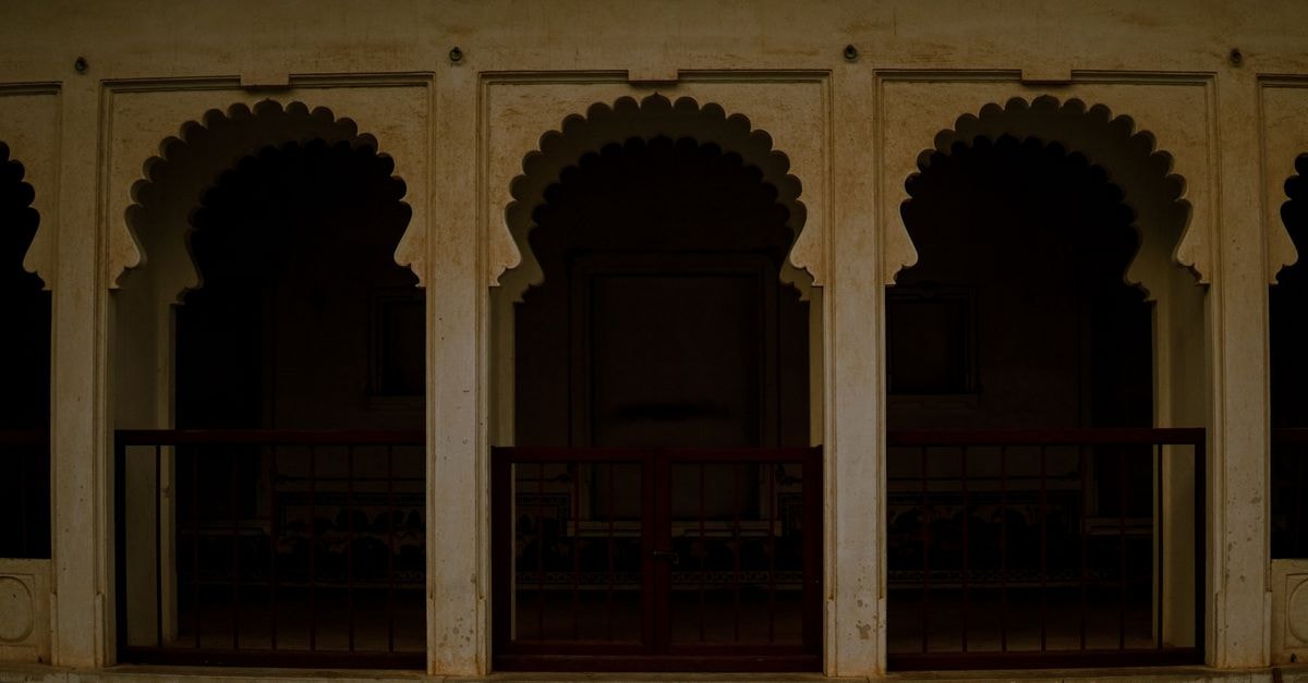 Detailed arches of the historic Kumbhalgarh Fort in Rajasthan, India, showcasing classic Rajasthani architecture.