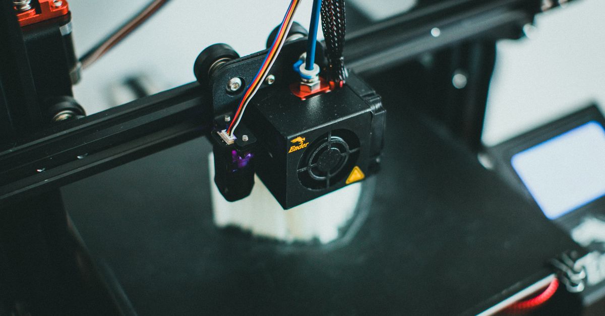 Sovol and Elegoo roll out new 3D printing products as HP Inc. earnings near Detailed shot of a 3D printer creating an object, focusing on the cooling fan and print head.