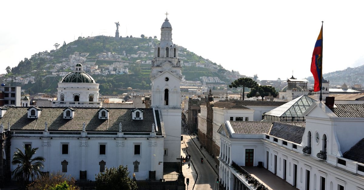 San Cristóbal Travel Guide: Andean Border City in the Clouds Aerial view of colonial buildings and El Panecillo in Quito, Ecuador.