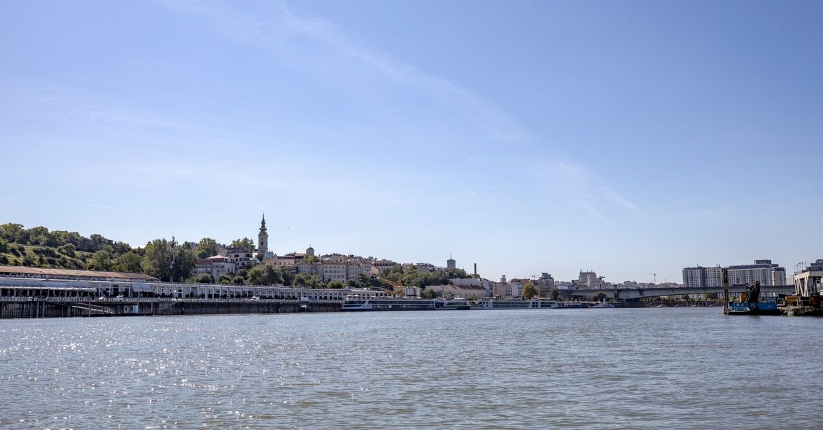 Hôtel Astrid, Rouen — Steps from the Gare SNCF Panoramic view of Belgrade's skyline along the Danube River under a clear sky.