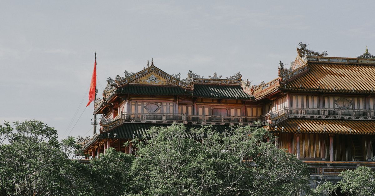 Scenic view of the iconic Meridian Gate in Hue, Vietnam, showcasing traditional architecture.