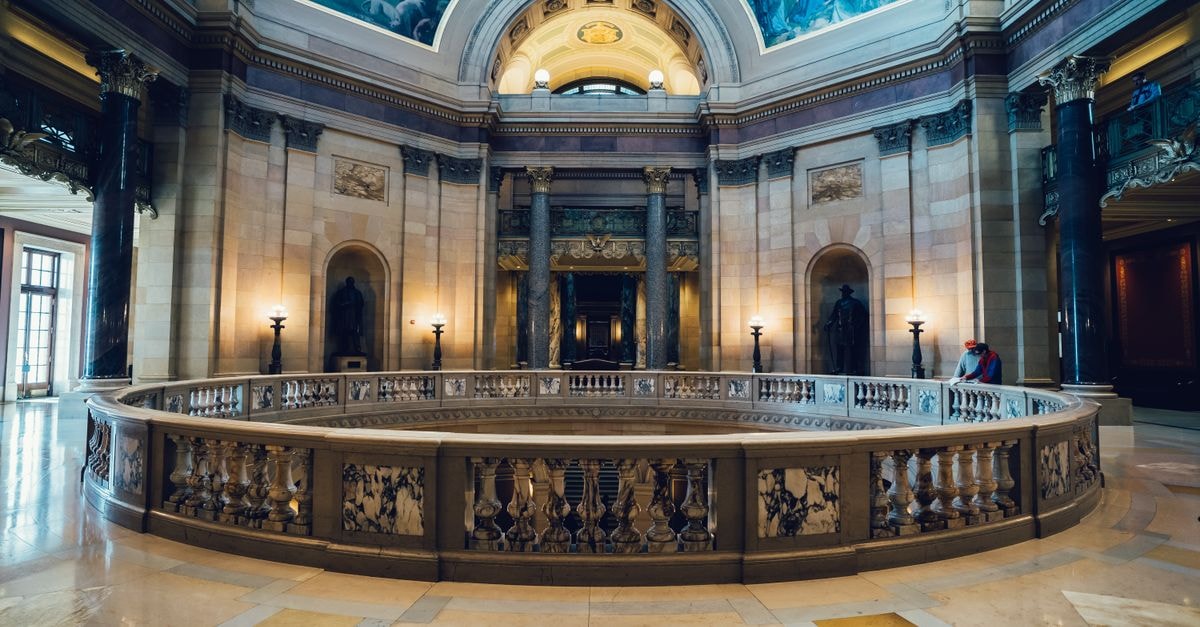 Harrisburg Travel Guide: A Capital of Quiet Surprises A stunning view of a grand museum hall with ornate columns and beautiful ceiling art.