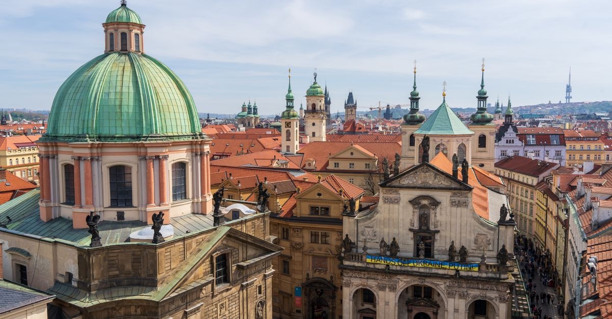 Univerzitní hotel Opitzův dům in Prague: A University-Run Stay in Celetná A breathtaking view of St. Francis of Assisi Church in Prague showcasing baroque architecture amidst cityscape.