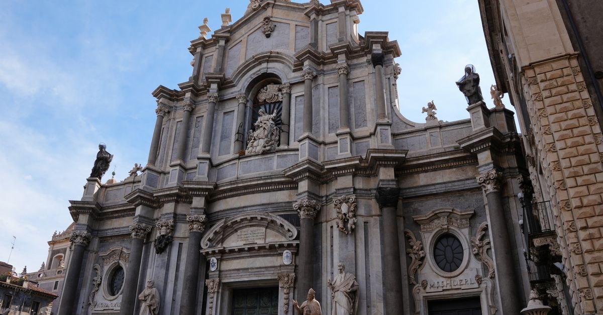 Stunning view of the ornate Baroque architecture of Catania Cathedral, Sicily, Italy.