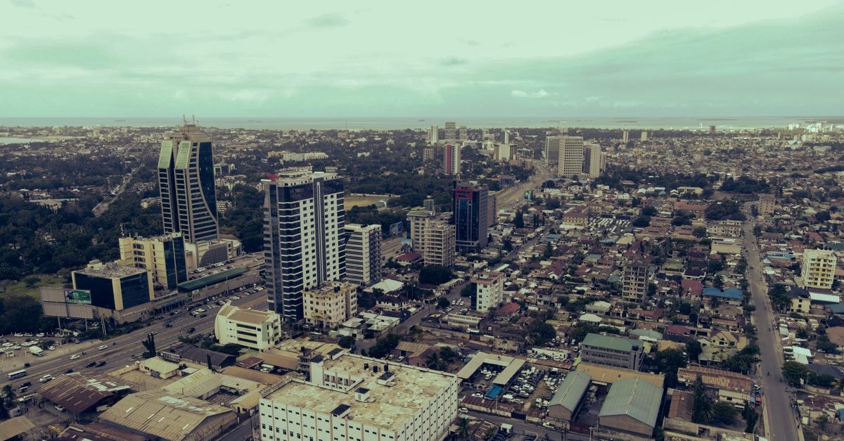 Résidence Les Cascades, Abidjan — A Vallon Address on Rue J42 Explore the dynamic skyline of Dar es Salaam, Tanzania in this aerial cityscape view.
