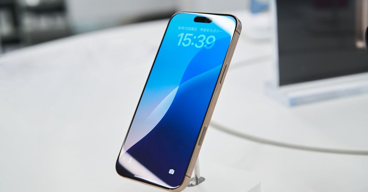 Smart Glasses Makers Showcase New Hardware and Privacy Features Ahead of Apple's Expected Entry Modern smartphone showcased in a tech store setting, highlighting its sleek design.