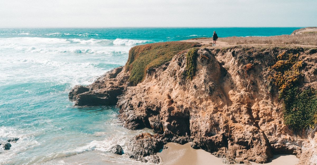 Central Coast Travel Guide: Planning Tips, Costs and Things to Do Explore the breathtaking rocky coast of Fort Bragg, California, with stunning ocean views and vibrant waves.
