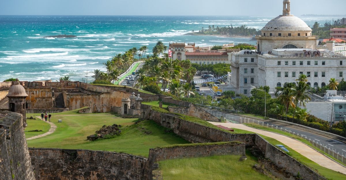 Capture of Castillo San Felipe del Morro in San Juan, Puerto Rico, with ocean and Capitol in view.